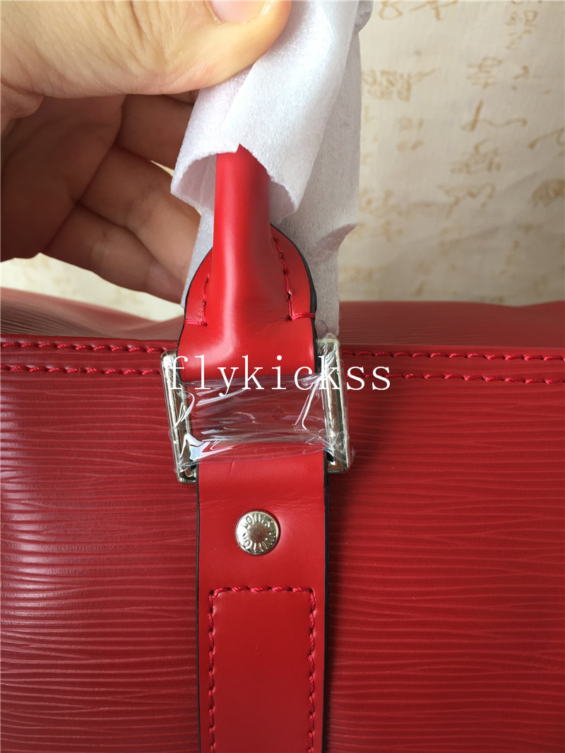 Supreme LVS Traveling Red Duffle Bag